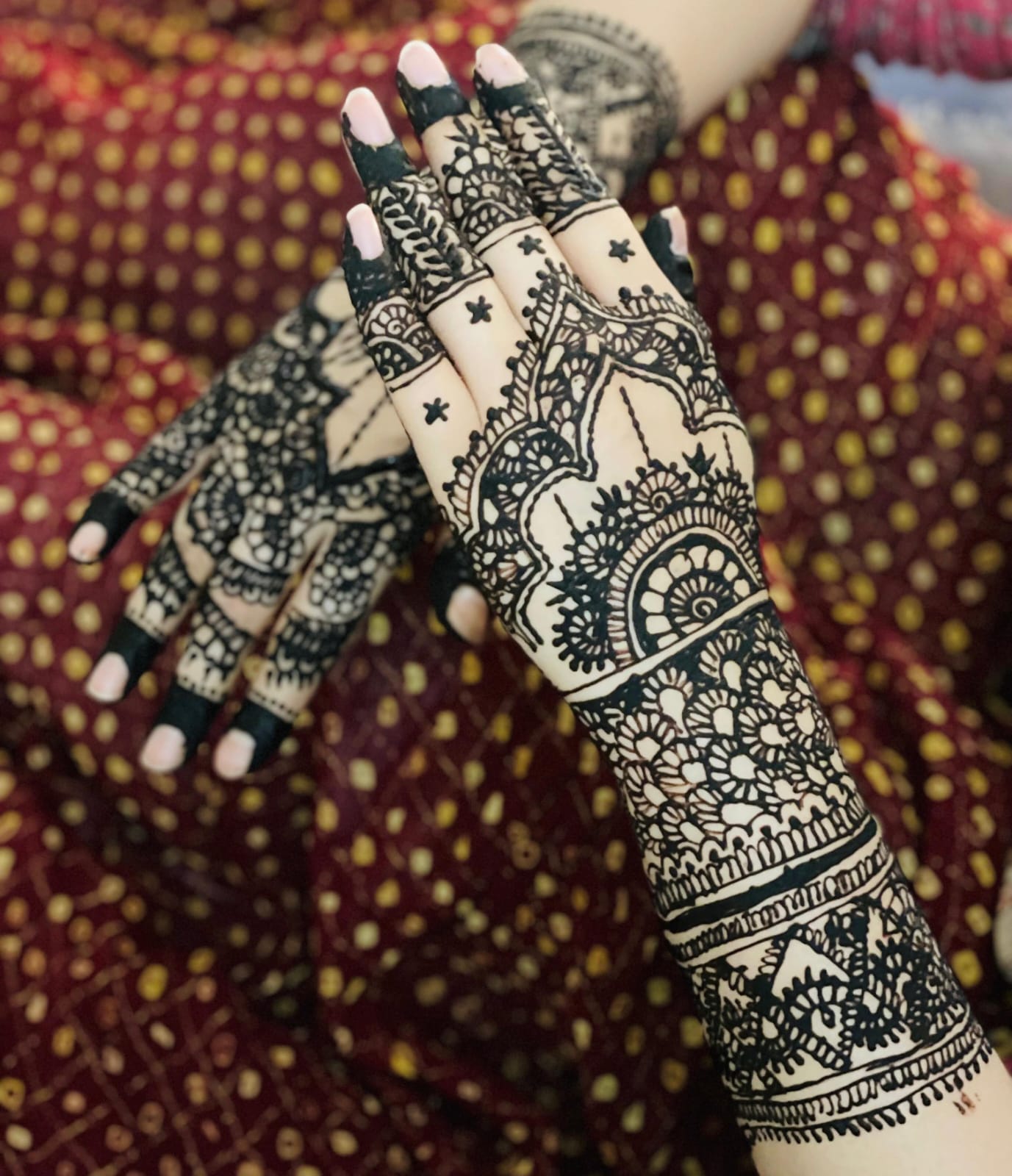 Intricate bridal mehndi design with detailed paisley patterns