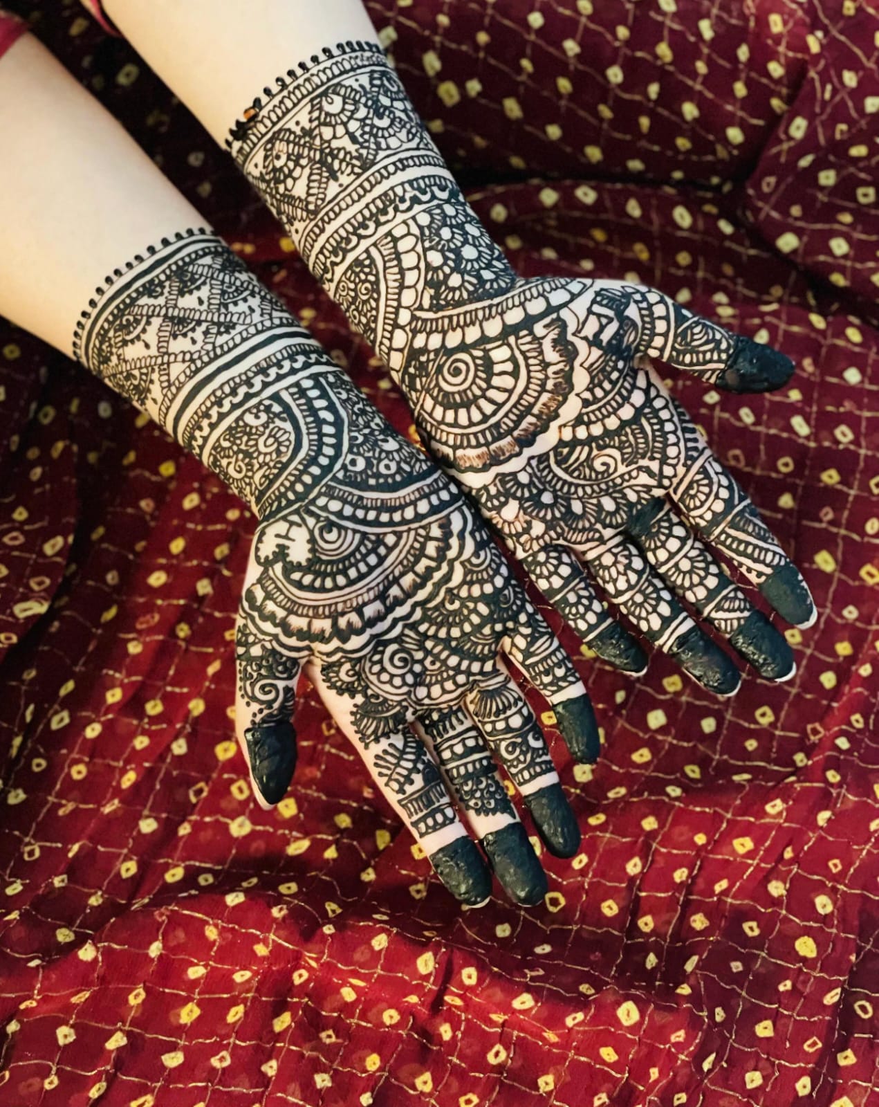 Detailed mehndi design featuring mandala patterns